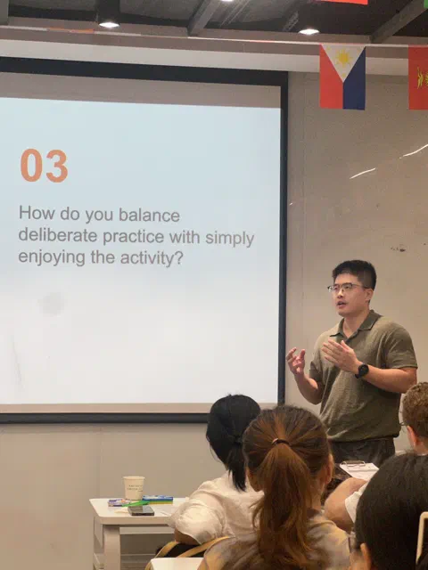 Jacob answering a Table Topic.
